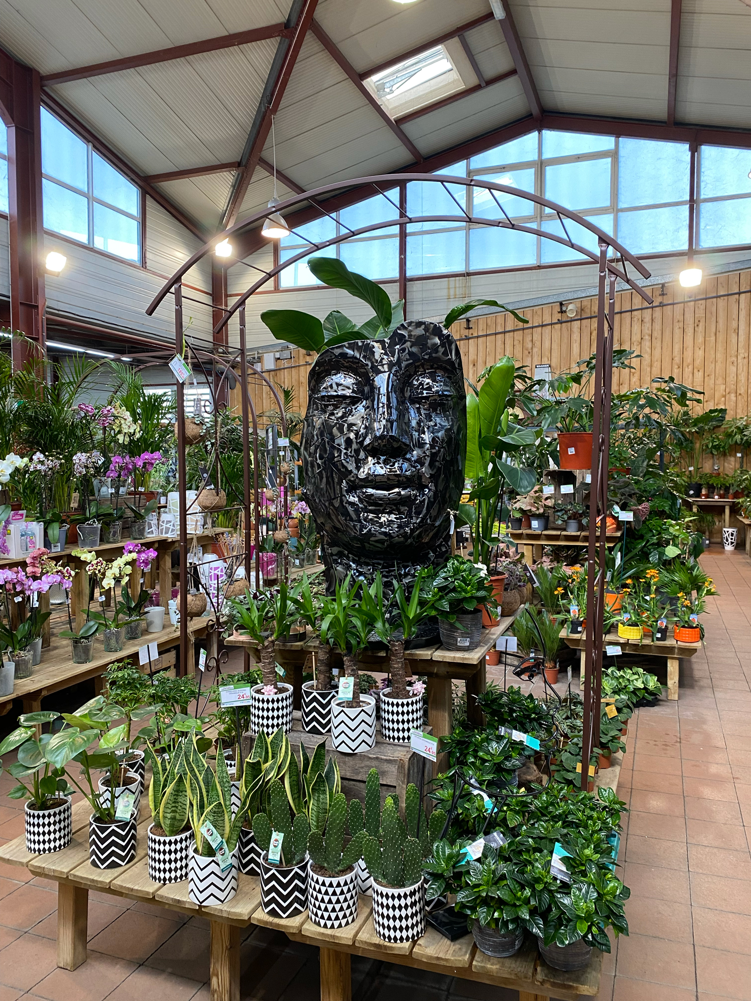 statue visage brillante en metal chamorin